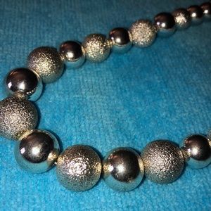 Silver tone bead necklace